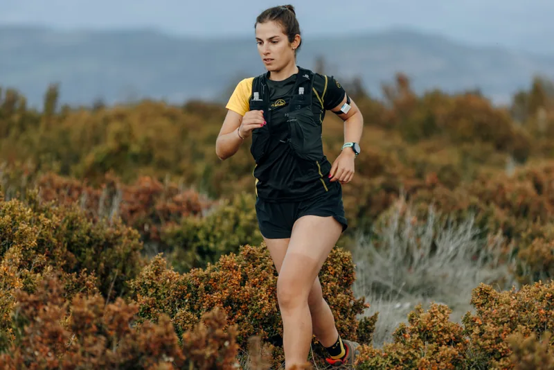 Trail runner wearing hDrop during outdoor exercise