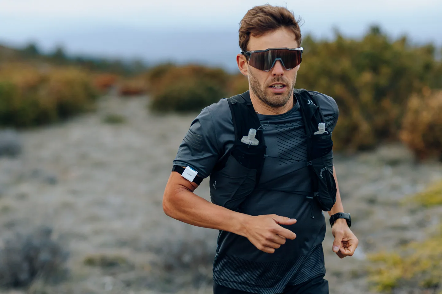 Athlete training outdoors wearing the hDrop sweat sensor