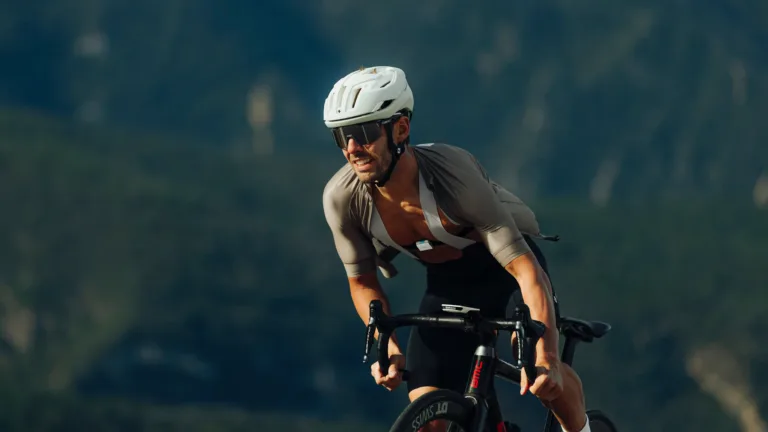 Cyclist wearing the hDrop sweat testing wearable on chest during endurance ride